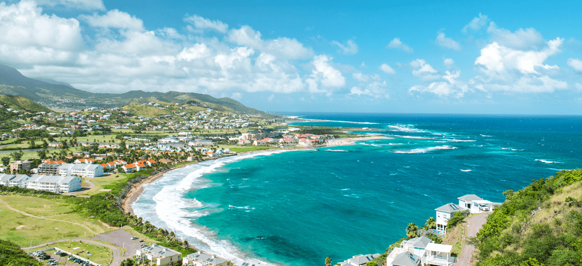 Aerial view of the St. Kitts coastline and turquoise bay